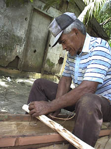 Clyde tying the outrigger boom